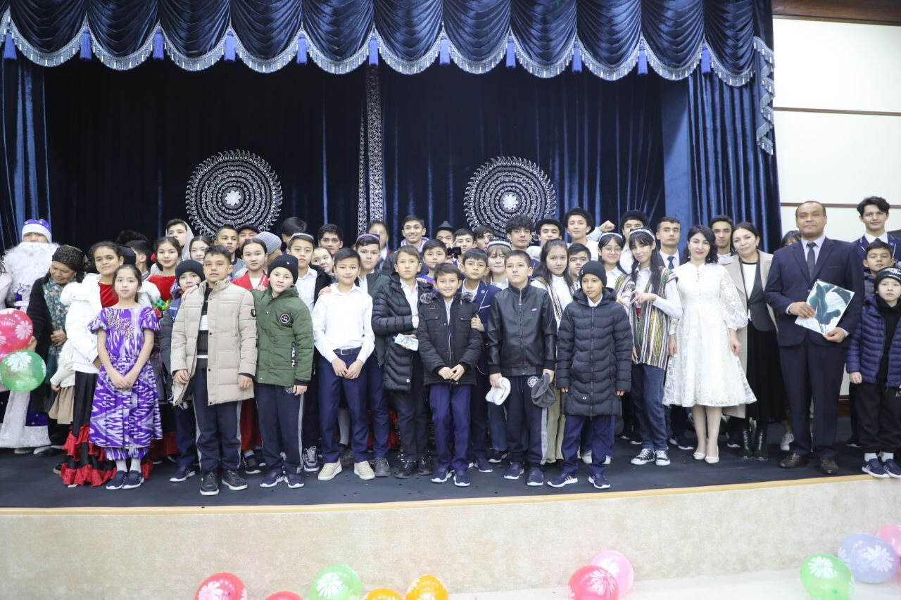Students on stage after the charity concert